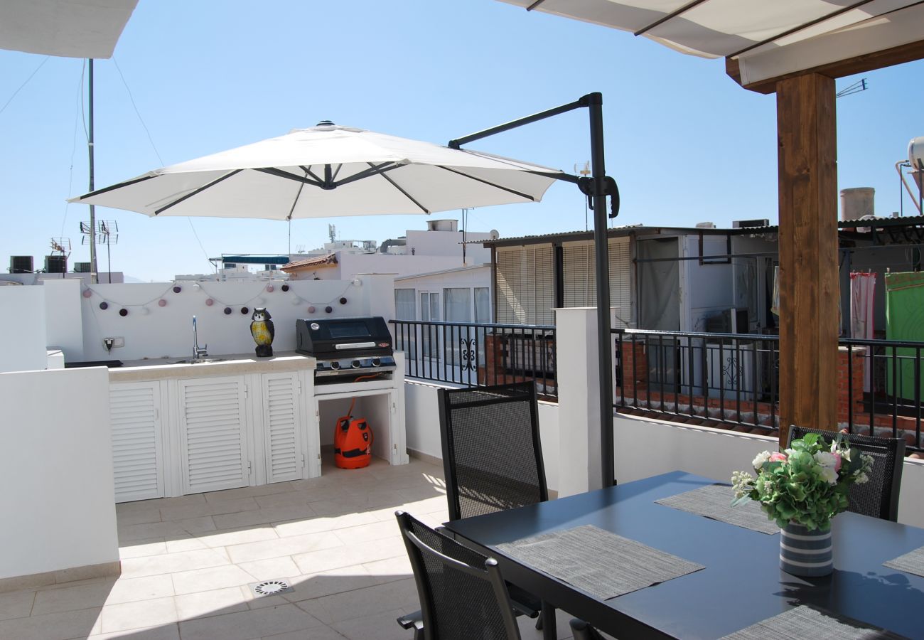 Terraza en la azotea con vistas a la ciudad