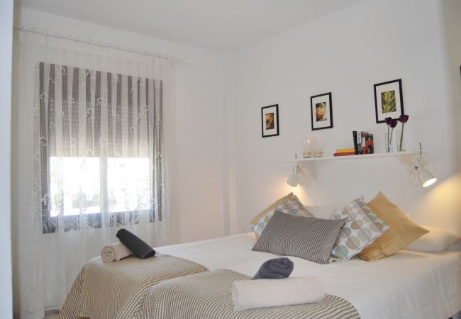 Bright double bedroom with twin beds