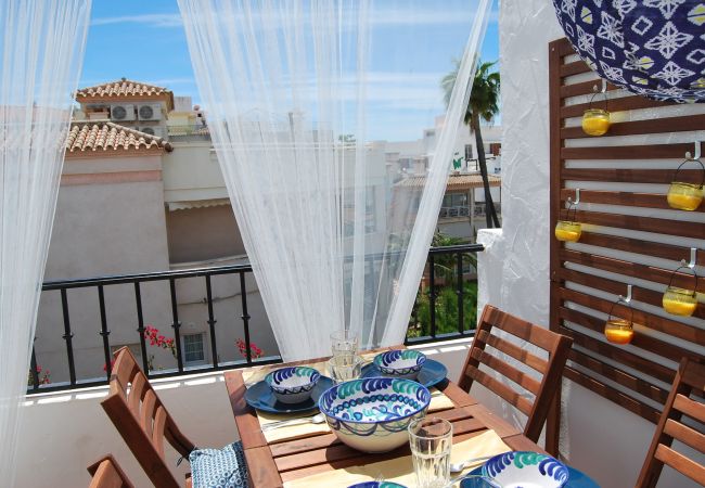 Balcony with dining area facing south