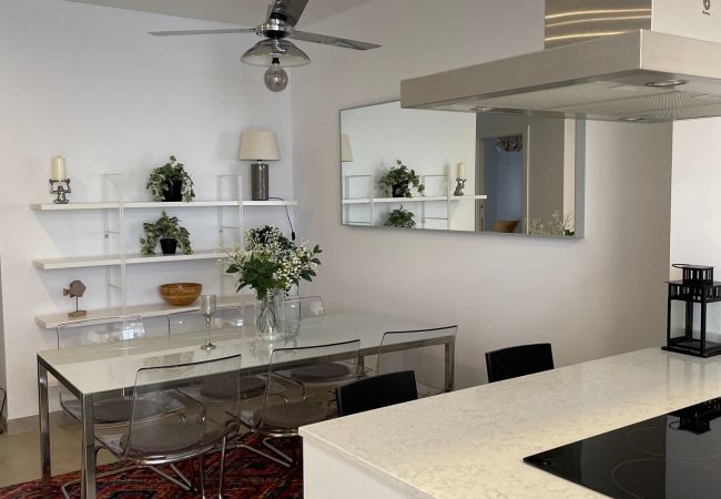 Spacious and modern kitchen with dining area