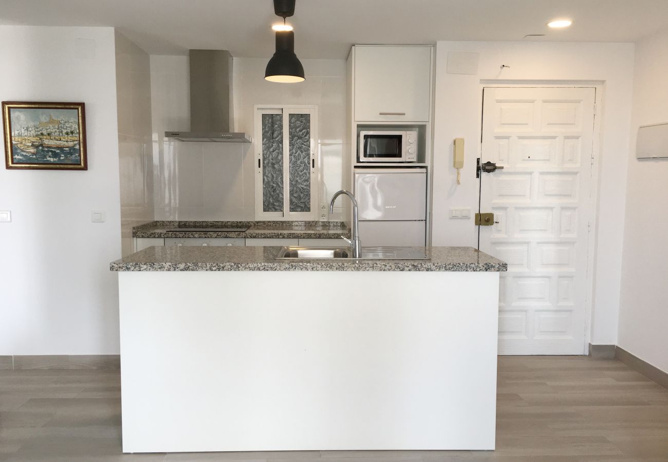 Open and airy, modern bar kitchen. 